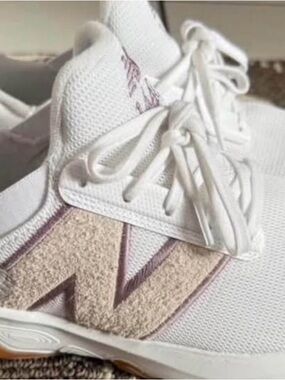 New Balance Women's White Sneakers with Light Pink Trim